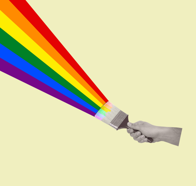 Regenboog verven Hand dat verfbostel vastheeft waarmee die regenboog schildert